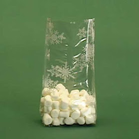 Girl Scout holiday gift idea-use snowflake cellophane bags and fill with candy. Have the girls make a card.