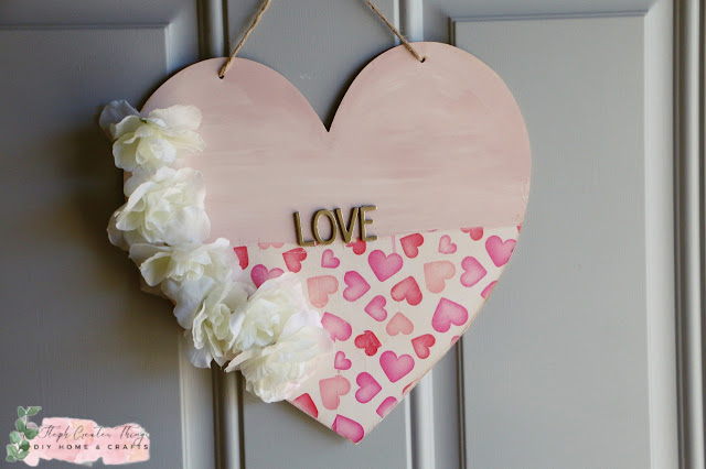 Wooden hanging heart paint pink with heart pattern and faux floral and gold letters