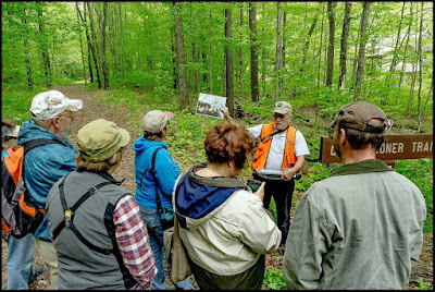 Stan Hess leads walk on sustainable forestry trail