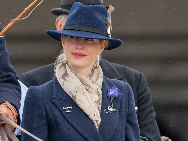 The Duchess of Edinburgh wore a graphic print shirt dress by Giambattista Valli. Lady Louise Windsor wore a navy jacket