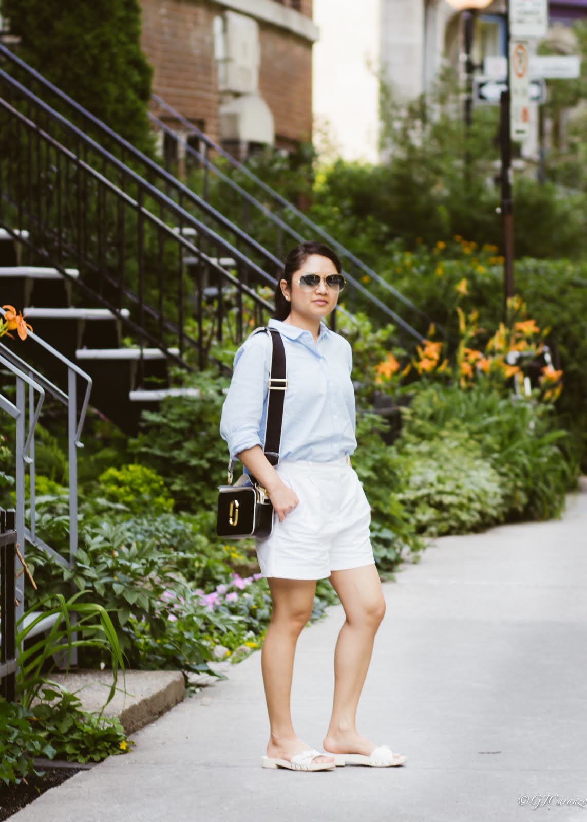 old navy light blue shirt_zara white shorts_coach bleeker sandals_marc jacobs sure shot bag_rayban aviator sunglasses in blue | petite fashion