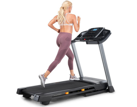 woman running on treadmill- treadmills for fitness and health