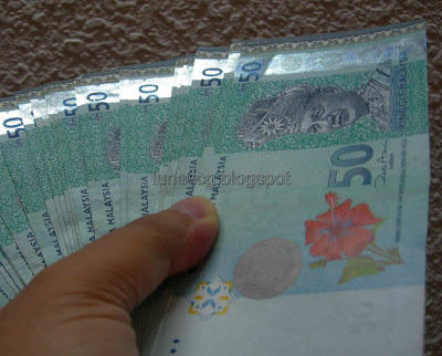 cash into Malaysia
