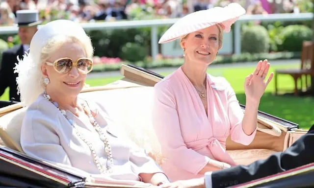 The Princess of Wales wore a red dress by Alexander McQueen. The Duchess of Edinburgh wore a pink dress. Princess Beatrice