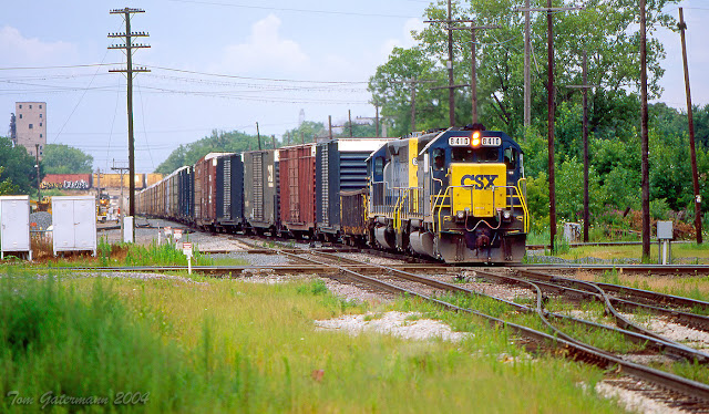 CSXT 8410 is eastbound on the IHB tracks, crossing the diamonds at Dolton Junction.