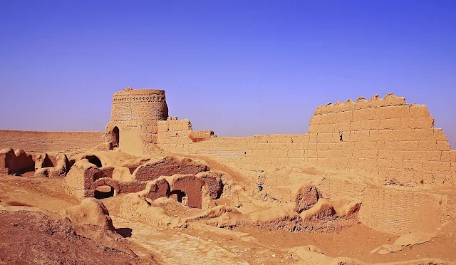 the mud brick castle and tower.