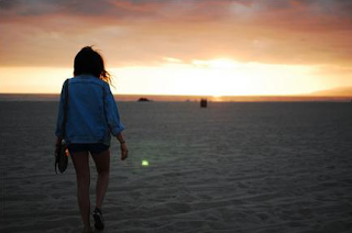 mujer en la playa