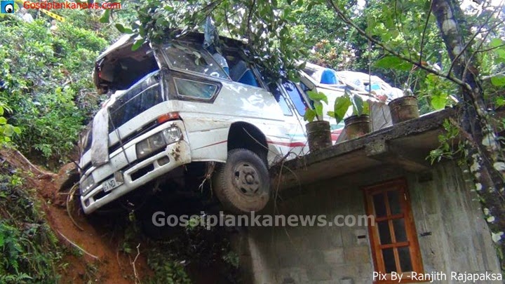 Bus slips down a precipice land on a roof of dwelling house