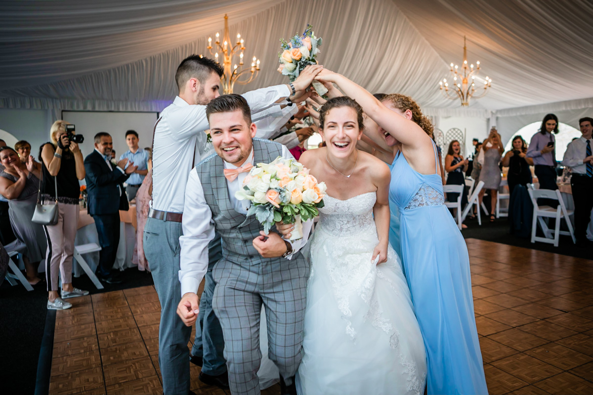 Couple Stylishly Welcomed To The Reception Venue.