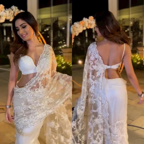 donal bisht backless white sheer saree tiny blouse