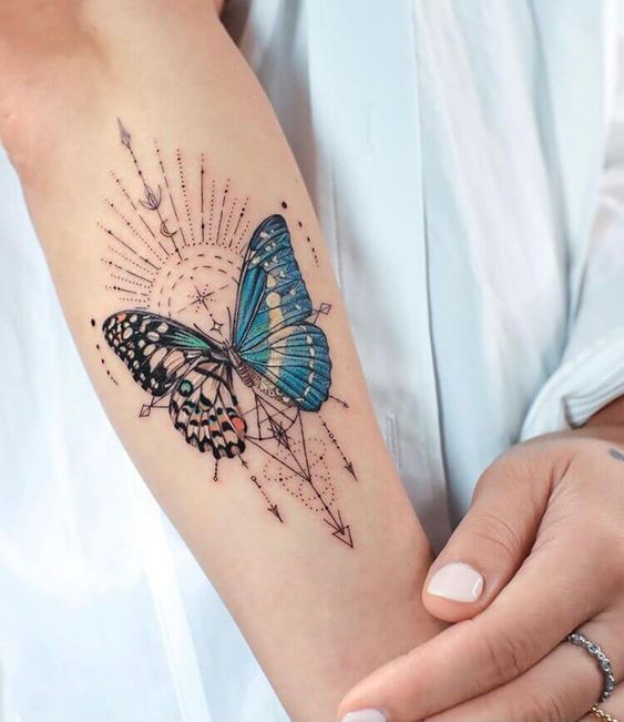 Tattoos Book: +3000 FREE Tattoo Designs: Butterfly tribal tattoos - Geometric Colourful Butterfly Arm Tattoo