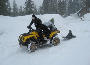 nate on sled behind 4 wheeler (1 of 1)