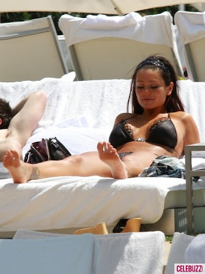 J Works on Her Bikini Tan in Miami