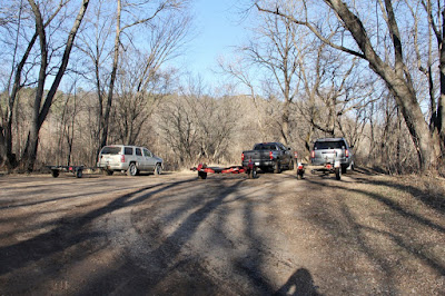 three of the four boat trailers at the launch area