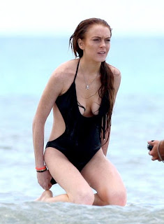 Ali and Lindsay Lohan hot surfing pictures from Hawaii