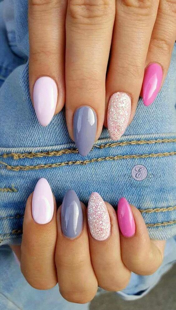 Stiletto nails with blue and pink