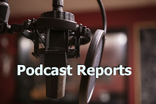 photo of a hanging podcast mic with PODCAST REPORTS in white letters.
