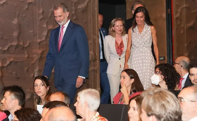 Queen Letizia wore a polka-dot belted midi dress by Laura Bernal. Queen Letizia is wearing beige leather pumps by Isabel Abdo Shoes