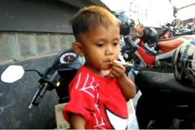 2-year-old Rapi Ananda Pamungkas from Sukabumi, Indonesia, who got hooked on smoking by smoking cigarette butts on the street  has become so addicted to smoking that he allegedly smokes up to forty cigarettes a day.