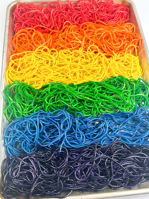 rainbow spaghetti on a baking sheet.