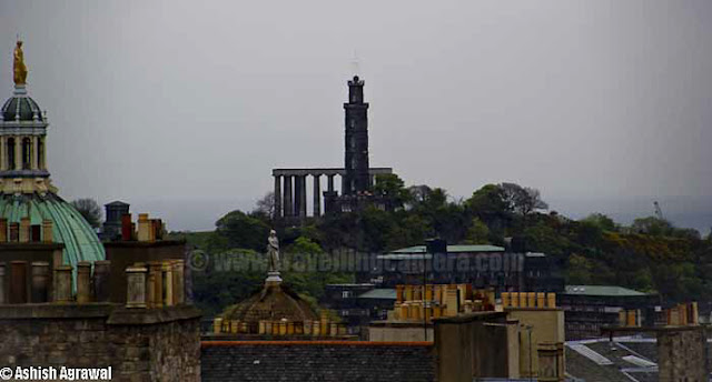 Edinburgh Castle is a fortress which dominates the skyline of the city of Edinburgh, Scotland !!! Human habitation of the site is dated back as far as the 9th century BC, although the nature of early settlement is not clear.  As one of the most important fortresses in the Kingdom of Scotland, Edinburgh Castle was involved in many historical conflicts, from the Wars of Scottish Independence ...Although Edinburgh Castle is formally owned by the Ministry of Defence of Scotland but most of the castle is now in the care of Historic Scotland and it is Scotland's most-visited paid tourist attraction.Edinburgh - Castle and train station !!The garrison left in the 1920s, but there is still a military presence at the castle... Military is largely ceremonial and administrative and including a number of regimental museums. It is the backdrop to the annual Edinburgh Military Tattoo and has become a recognizable symbol of Edinburgh and of Scotland.Another view of Edinburgh City from Royal Castle touching skylines..Inside Edinbugh Castle with some barracks on the left !!!!Inside Edinburgh CastleChapel inside Edinbugh Castle...People walking inside Inside Edinburgh CastleEdinburgh Castle - Mons MegMons Meg is a medieval super-gun now located at Edinburgh Castle, Scotland. There are varied views about it's origins, but it appears from the accounts of Philip the Good, Duke of Burgundy that it was made to his order around 1449 and sent as a gift 8 years later to King James II of Scotland, with other artillery supplies... This is picked from Wikipedia !Edinburgh Castle - Walking on the streets..View of Edinburgh city from Castle...St. Margaret's Chapel inside Edinburgh Castle - One on the oldest sections of this Castle !!!St. Margaret's Chapel in inside Edinburgh Castle of Scotland and it's the oldest surviving building in Edinburgh, Scotland. An example of Romanesque architecture, it is a Category A listed buildingLegend had it that St. Margaret worshiped in this small chapel, but recent research indicates that it was built at the beginning of the 12th century by her fourth son who became King David in 1124. The building has been restored and the interior presents much the same appearance as it did when first in use.Some colorful paintings form St. Margaret's Chapel inside Edinburgh Castle - One on the oldest sections of this CastleHalf Moon Battery and David's Tower...The Half Moon Battery, which remains a prominent feature on the east side of the castle, was built as part of the reconstruction works..Edinburgh Castle - Canons on the outer walls of this CastlView of Edinburgh City from Castle ...Oldest building in the castle, and in Edinburgh, is the small St. Margaret's Chapel ...Oldest building in the castle, and in Edinburgh- small St. Margaret's ChapelThe Royal Palace in Crown SquareThere are clear Directions about the places inside Edinburgh Castle - Royal Apartments, Great Hall etcThe Royal Palace comprises the former royal apartments which were the residence of the later Stewart monarchs. It was begun in the mid 15th century and it originally communicated with David's Tower.The Royal Palace in Crown Square - Inside Edinburgh Castle ... A closer look !!!Flag inside Edinburgh Castle ..There are lots of cannons on outer walls of Edinburgh Castle from where whole city is clearly visible ... Since it's situated on height, these areas give wonderful view of Edinburgh City !!The Scottish National War Memorial inside Edinburgh Castle - Scotland by Ashish ...The Scottish National War Memorial is located inside Edinburgh Castle and commemorates Scottish soldiers... It's for those serving with Scottish regiments, who died in the two world wars and in more recent conflicts. The monument was formally opened in 1927. It is housed in a redeveloped barrack block in Crown Square, at the heart of the castle, and incorporates numerous monuments.Inside Edinburgh Castle - People walking in Relaxed mode ...Canon areas inside Edinburgh Castle - Scotland Travel Photo Journey by Ashish ..A View of Edinburgh City from Castle of Edinburgh ..Beautiful Edinburgh City with nice view to the water-body in background...Architecture of Edinburgh City and Castle is really lovable... n would want to click photographs of such places again in future..Tourists looking at the map to ensure that they don't miss anything inside the castle. Also it helps to know which are main attractions which must be visited and which others can be compromised as per available time...Beautiful buildings around Royal Mile in Edinburgh city !!!The Royal Mile is a succession of streets which form the main thoroughfare of the Old Town of the city of Edinburgh in Scotland.Part of the Royal mile inside Edinburgh city of Scotland ...The Royal Mile is approximately one Scots mile long and runs between two foci of history in Scotland, from Edinburgh Castle at the top of the Castle Rock down to Holyrood Abbey. The streets which make up the Royal Mile are (west to east) Castle Esplanade, Castlehill, Lawnmarket, High Street, Canongate and Abbey Strand. The Royal Mile is Edinburgh Old Town's busiest tourist street...Edinburgh Castle is huge as you might have got an idea from all these photographs.. See the size of people roaming around and building around... This photograph must be helpful in setting right perspective about buildings inside Castle !!!Camera Obscura at Edinburgh City of Scotland ...The camera obscura is an optical device that projects an image of its surroundings on a screen. It is used in drawing and for entertainment, and was one of the inventions that led to photography. The device consists of a box or room with a hole in one side. Light from an external scene passes through the hole and strikes a surface inside where it is reproduced, upside-down, but with color and perspective preserved. The image can be projected onto paper, and can then be traced to produce a highly accurate representation.