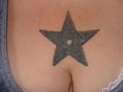 breast star tattoo for girls