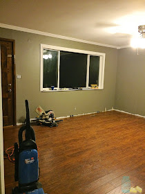 living room renovation during process laminte floors