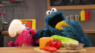 Sesame Street Episode 4816. Cookie Monster's Foodie Truck. A boy orders some tacos from Cookie Monster and Gonger.