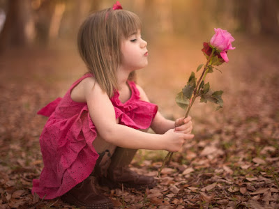 foto de niña con rosa 