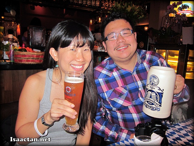 #3 Evelyn and Wilson looking cheerful with their beers 