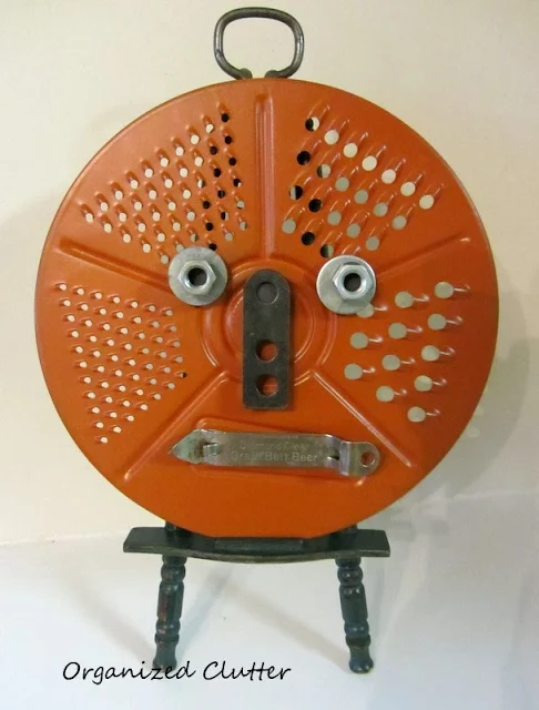 Repurposed Grater Jack o'Lantern www.organizedclutterqueen.blogspot.com