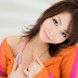 Asuka Kimishima in orange sweater