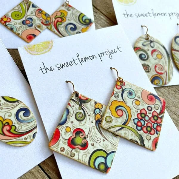 array of square and oval florentine patterned paper earrings
