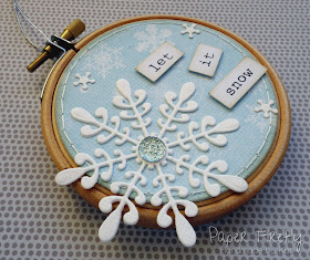 Snowflake decorated embroidery hoop