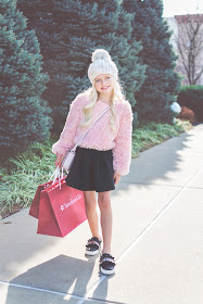 fur sweater girl outfit idea beanie skirt sneakers glitter ruffle kate spade winter christmas outfit