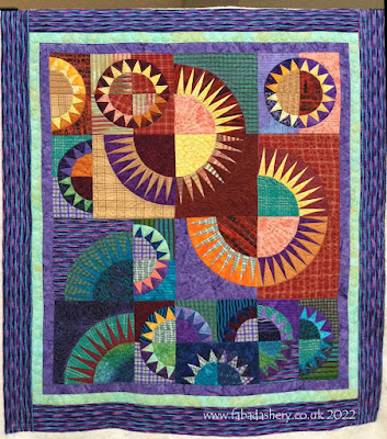 Scrappy New York Beauty Quilt made by Jo, custom quilted at Fabadashery Longarm Quilting