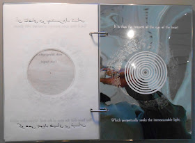 Two-page spread of Fragments of Light showing mylar reflection