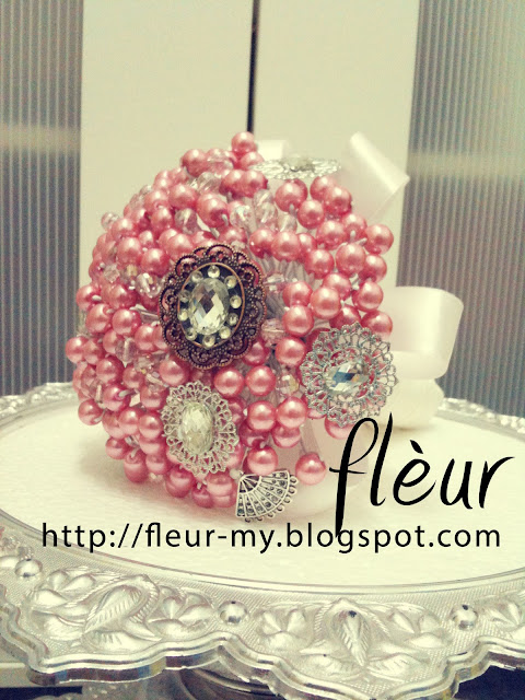 Pink Pearl and Brooch Hand Bouquet by Fleur. Based in kl/selangor, Malaysia.