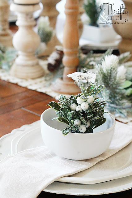 Farmhouse dining room Christmas decor and decorating ideas. Christmas tablescape ideas. Christmas place settings. How to decorate your dining room for Christmas. Dining room wall christmas decor. Dining room with shiplap walls. Neutral christmas dining room decor. Candlestick tablescape.