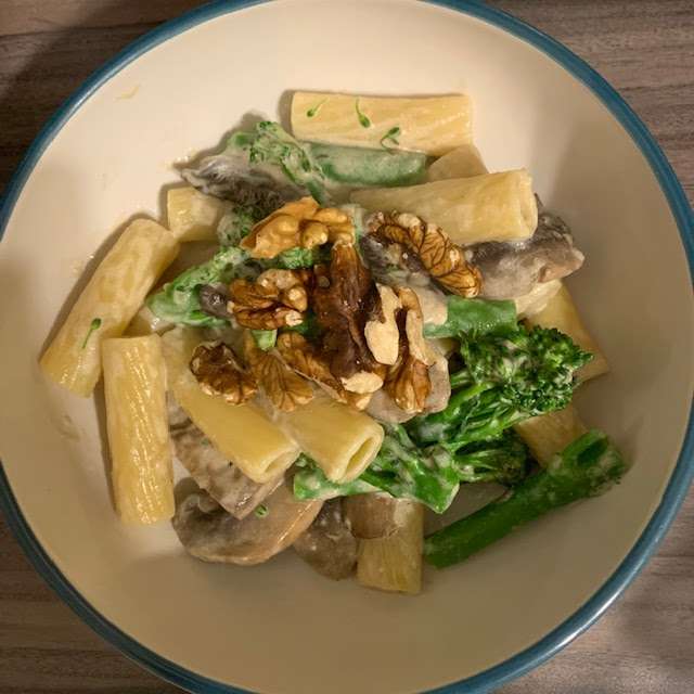 A bowl of creamy mushroom pasta