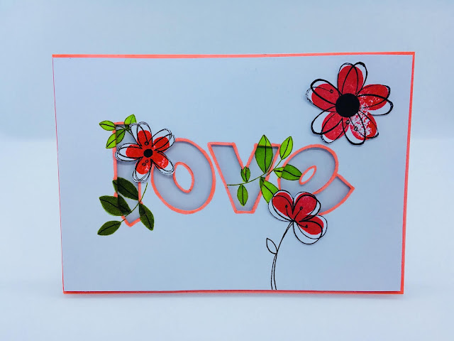 Flowers and leaves rambling in and out the word love handmade by Annelies Brown