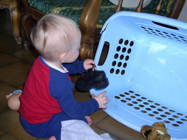 Benjamin helping with laundry