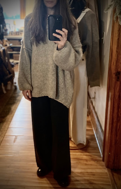 black pants with oversized taupe sweater