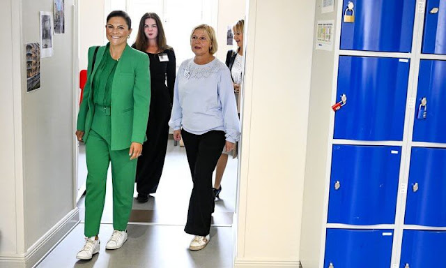 Crown Princess Victoria wore a green lapelless fitted blazer by Zara, and slim fit trousers by Zara. Green pleated front blouse. Adidas