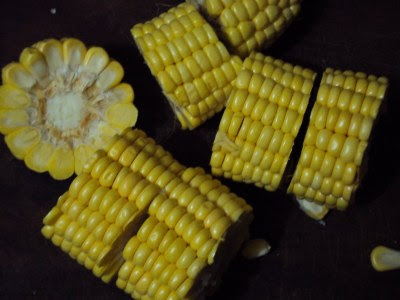 sweet corn on the cob curried with tomato concasse 