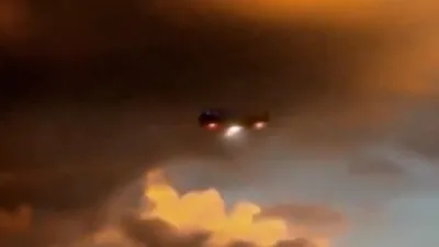 Black UFO filmed in the sky by unknown eyewitness.