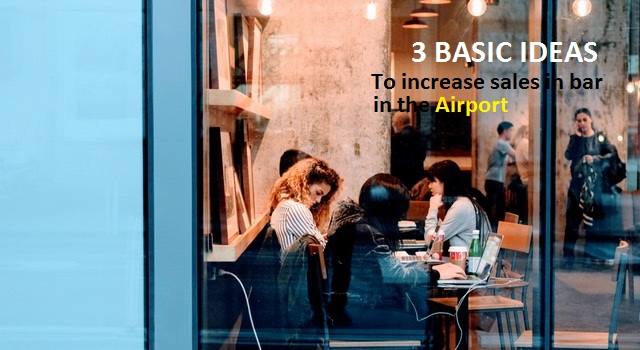 A girl is seen streaming music at an airport bar while waiting for her flight.