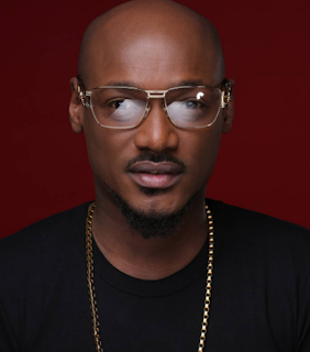 Nigerian Professor Slams 2face Idibia -You are a bloody illiterate who made babies all over the place