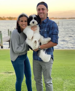 Justin Thomas And His Girlfriend Jillian Wisniewski With Their Sheepodoodle