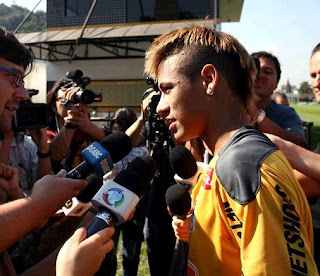 Neymar attends the press conference on training field